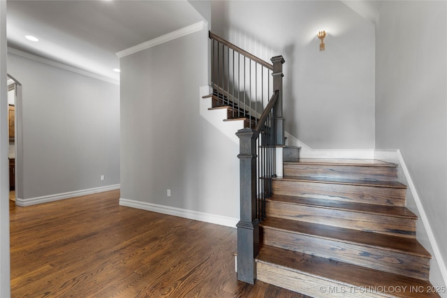 3528 S Wheeling Ave, Tulsa, OK 74105 - staircase featuring arched walkways, crown molding, wood finished floors, and recessed lighting