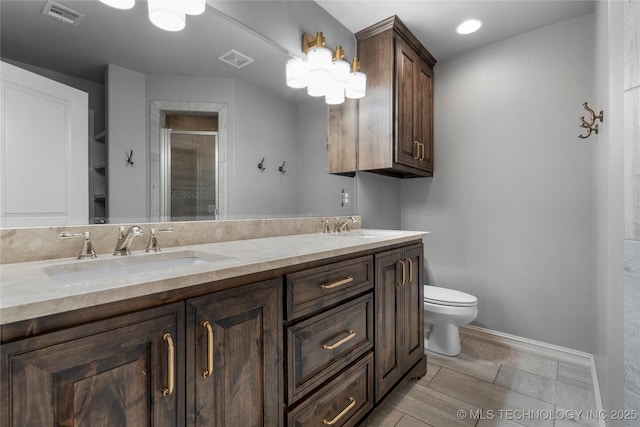 3528 S Wheeling Ave, Tulsa, OK 74105 - bathroom featuring double vanity, a stall shower, and recessed lighting