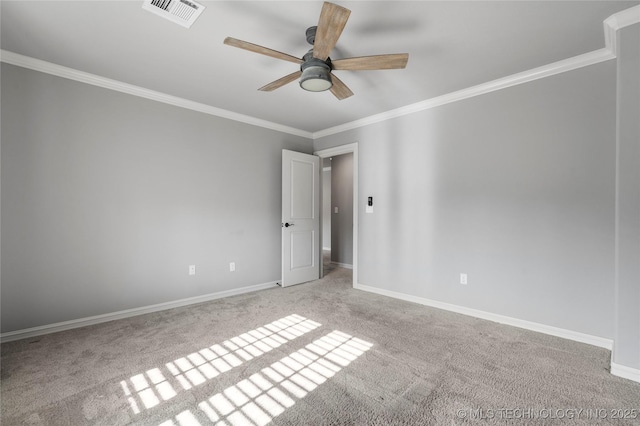 3528 S Wheeling Ave, Tulsa, OK 74105 - empty room featuring a ceiling fan, carpet flooring, and ornamental molding