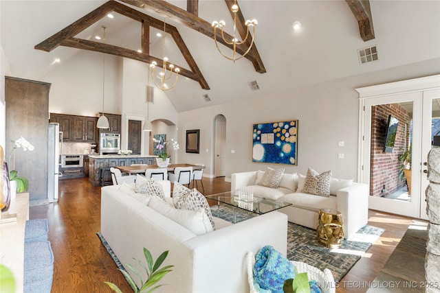 3528 S Wheeling Ave, Tulsa, OK 74105 - living room featuring high vaulted ceiling, arched walkways, beam ceiling, dark wood-type flooring, and a chandelier