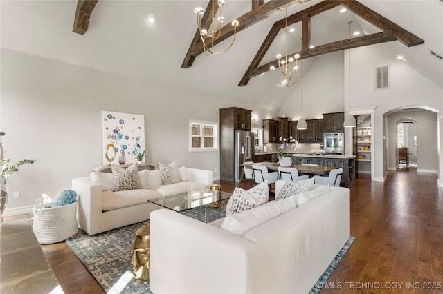 3528 S Wheeling Ave, Tulsa, OK 74105 - living room featuring arched walkways, high vaulted ceiling, beamed ceiling, a chandelier, and dark wood finished floors