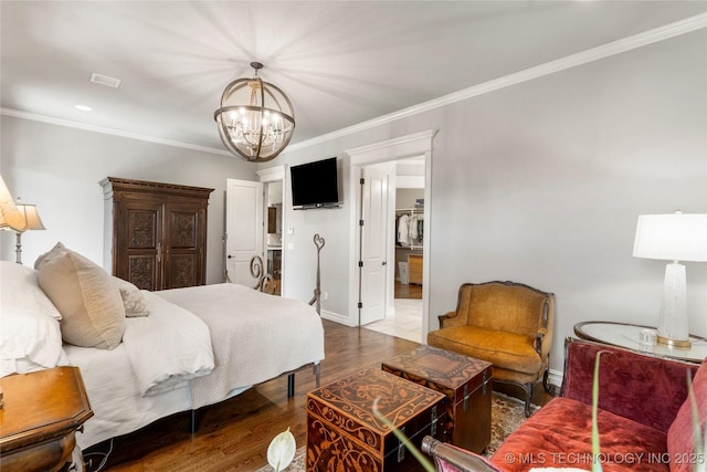 3528 S Wheeling Ave, Tulsa, OK 74105 - bedroom featuring a chandelier, ornamental molding, and wood finished floors