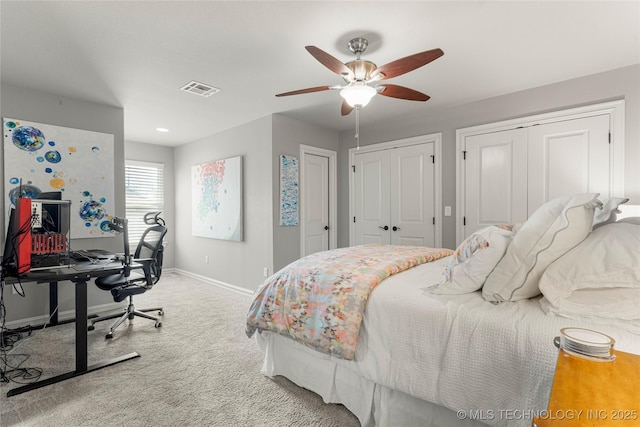 3528 S Wheeling Ave, Tulsa, OK 74105 - bedroom featuring carpet floors, an office area, multiple closets, and ceiling fan