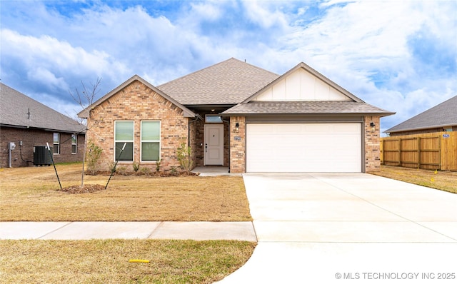 ranch-style house with fence, an attached garage, central AC, brick siding, and driveway