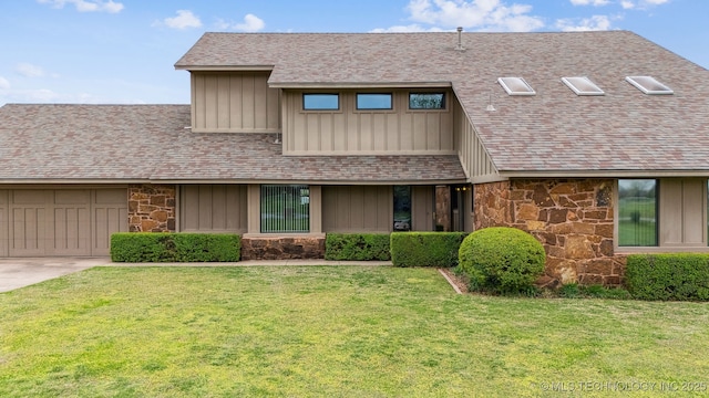 13542 N 155th E Ave, Collinsville, OK 74021 - view of front facade featuring stone siding, a garage, a front yard, and a shingled roof