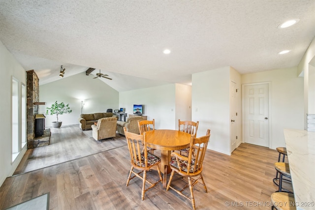 13542 N 155th E Ave, Collinsville, OK 74021 - dining area with light wood-style flooring, a textured ceiling, a ceiling fan, and recessed lighting