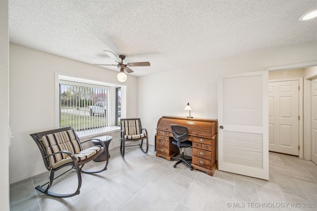 13542 N 155th E Ave, Collinsville, OK 74021 - office space with ceiling fan, light tile patterned floors, and a textured ceiling