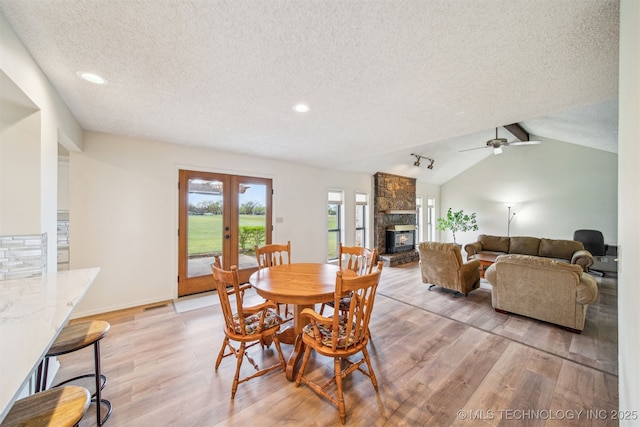 13542 N 155th E Ave, Collinsville, OK 74021 - dining room with a textured ceiling, light wood-style floors, french doors, recessed lighting, and a ceiling fan