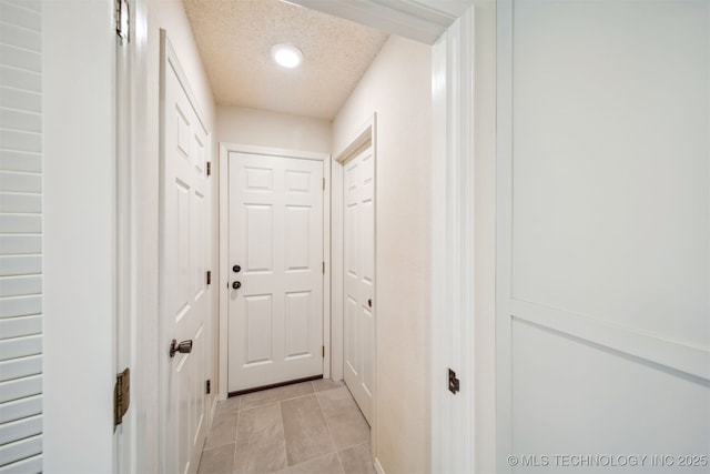 13542 N 155th E Ave, Collinsville, OK 74021 - corridor featuring light tile patterned flooring and recessed lighting