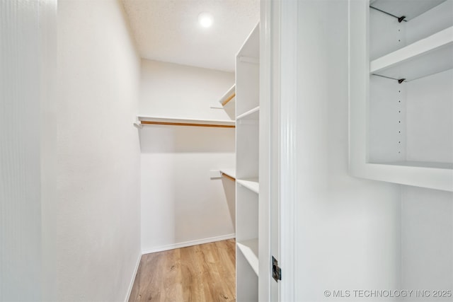 13542 N 155th E Ave, Collinsville, OK 74021 - spacious closet with wood finished floors