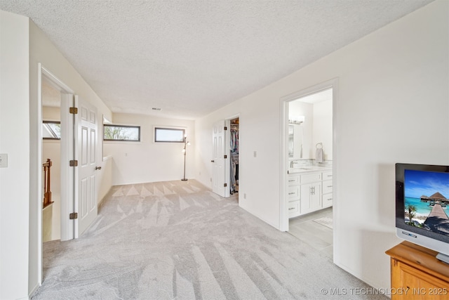 13542 N 155th E Ave, Collinsville, OK 74021 - unfurnished living room with light colored carpet and a textured ceiling