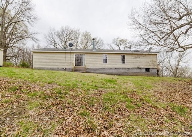 24606 S Red Bud Cir, Afton, OK 74331 - back of property featuring entry steps, a lawn, and crawl space