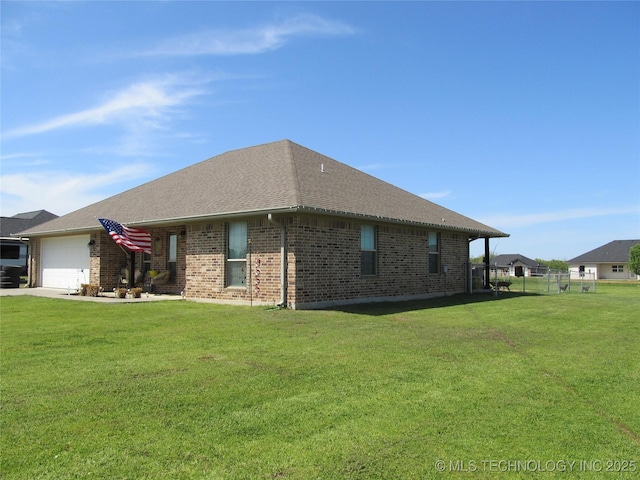 60 S Kaylee Rd, Calera, OK 74730 - exterior space with roof with shingles, a garage, brick siding, and a yard
