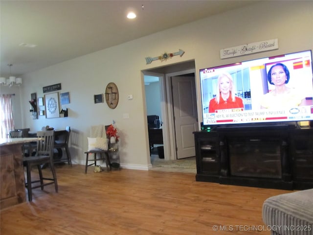 60 S Kaylee Rd, Calera, OK 74730 - living area featuring baseboards, wood finished floors, and recessed lighting