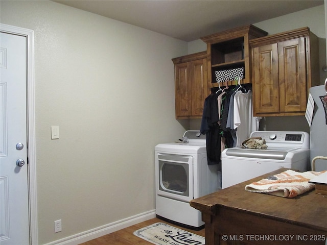 60 S Kaylee Rd, Calera, OK 74730 - laundry room featuring independent washer and dryer, cabinet space, baseboards, and wood finished floors