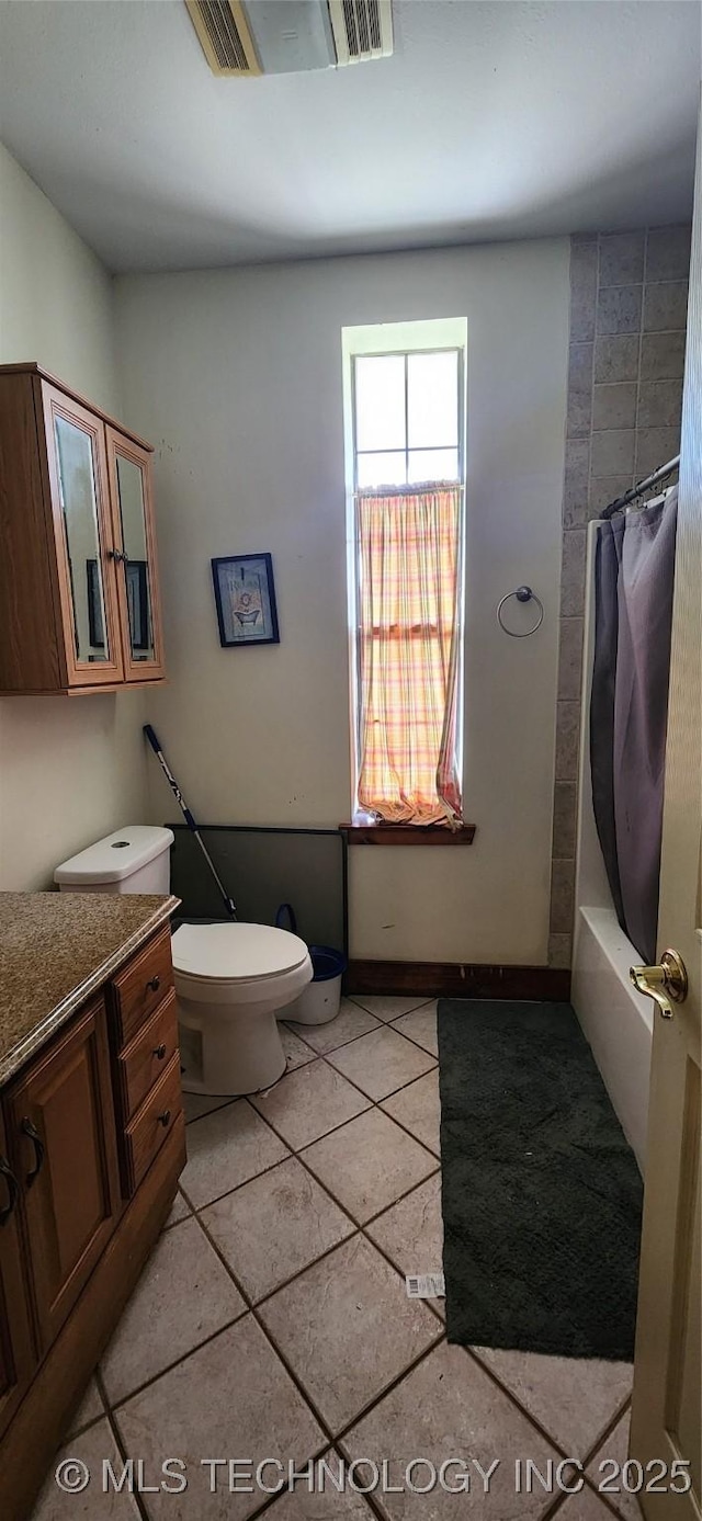4100 Sally Brown Rd, Muskogee, OK 74403 - bathroom featuring tile patterned flooring, toilet, and vanity