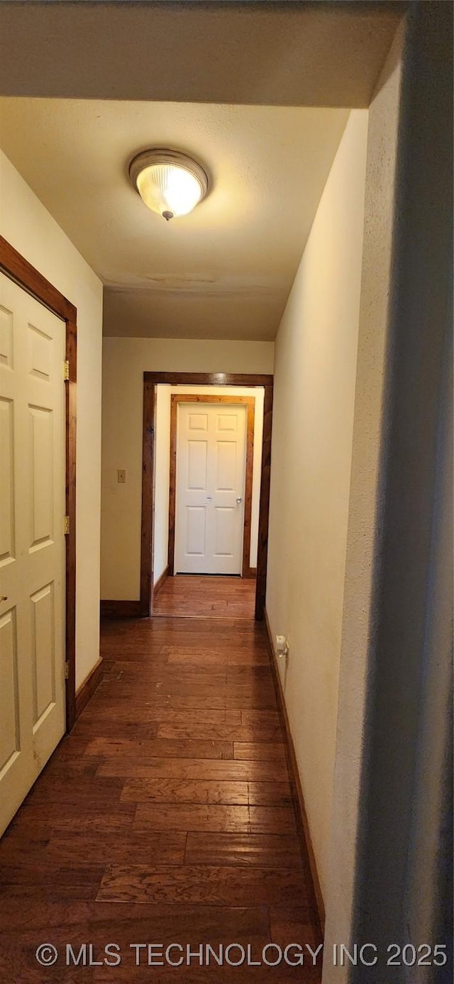 4100 Sally Brown Rd, Muskogee, OK 74403 - hall with baseboards and dark wood-style floors