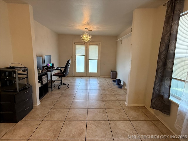 office with baseboards and light tile patterned floors