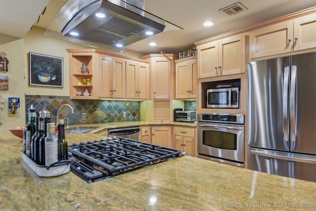kitchen featuring a sink, light brown cabinetry, stainless steel appliances, island exhaust hood, and visible vents
