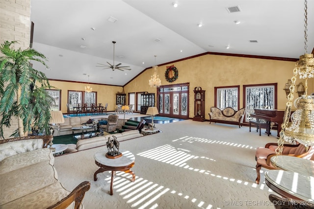 carpeted living room featuring high vaulted ceiling, visible vents, ceiling fan with notable chandelier, and ornamental molding