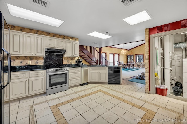 kitchen with under cabinet range hood, black appliances, lofted ceiling, and visible vents