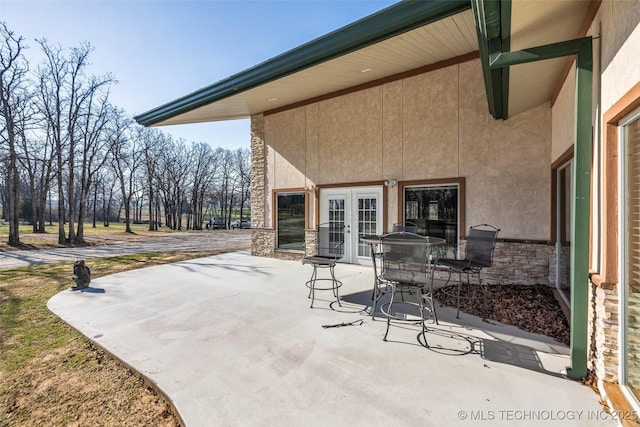 view of patio featuring french doors