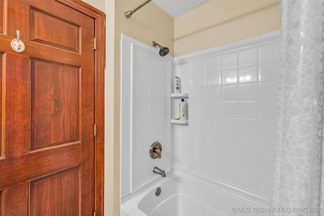 full bathroom featuring shower / bath combination with curtain