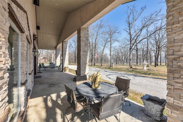 view of patio featuring outdoor dining space