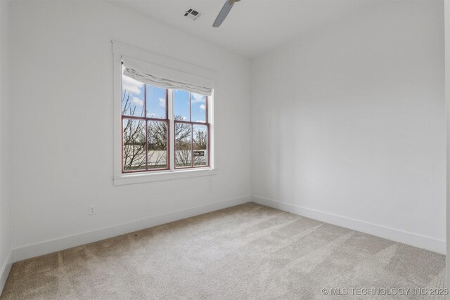 29 Water St Unit 4, Carlton Landing, OK 74432 - empty room featuring a ceiling fan, baseboards, light colored carpet, and visible vents