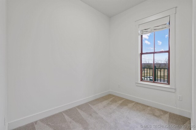 29 Water St Unit 4, Carlton Landing, OK 74432 - empty room with baseboards and light carpet