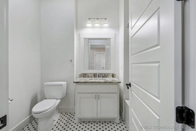 29 Water St Unit 4, Carlton Landing, OK 74432 - bathroom with toilet, vanity, and baseboards