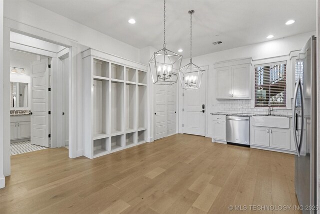 29 Water St Unit 4, Carlton Landing, OK 74432 - interior space featuring recessed lighting, an inviting chandelier, light wood-type flooring, a sink, and visible vents