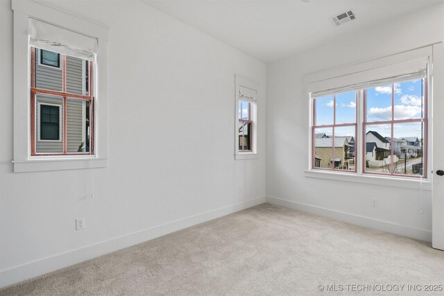 29 Water St Unit 4, Carlton Landing, OK 74432 - empty room featuring baseboards, visible vents, and carpet
