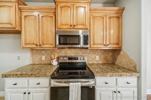 12916 E 181st St S, Bixby, OK 74008 - kitchen featuring appliances with stainless steel finishes, tile countertops, decorative backsplash, and white cabinetry