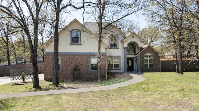 12916 E 181st St S, Bixby, OK 74008 - view of front facade with brick siding and stucco siding