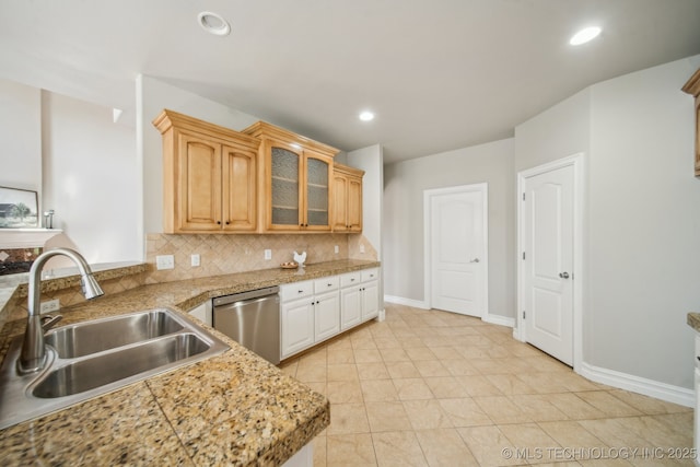 12916 E 181st St S, Bixby, OK 74008 - kitchen featuring dishwasher, a sink, backsplash, glass insert cabinets, and recessed lighting