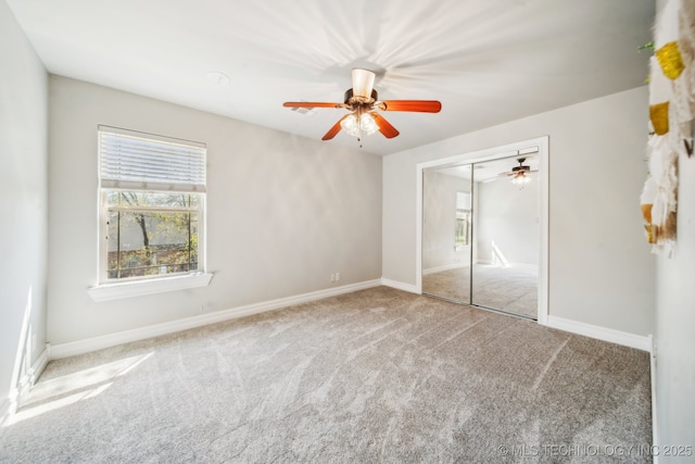 12916 E 181st St S, Bixby, OK 74008 - unfurnished bedroom featuring multiple windows, carpet, a closet, and baseboards