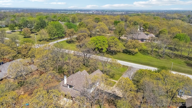 12916 E 181st St S, Bixby, OK 74008 - view from above of property with a heavily wooded area