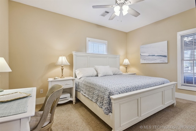 447560 Angler Way, Vinita, OK 74301 - bedroom featuring carpet flooring, baseboards, multiple windows, and visible vents
