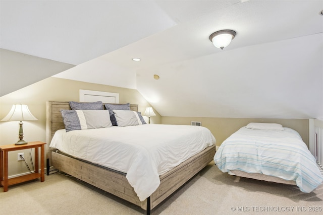 447560 Angler Way, Vinita, OK 74301 - bedroom with light carpet, vaulted ceiling, and recessed lighting
