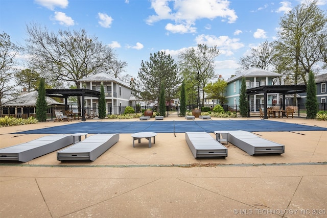 447560 Angler Way, Vinita, OK 74301 - pool featuring a patio area, a residential view, and fence