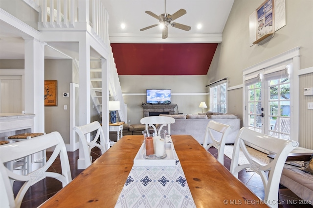 447560 Angler Way, Vinita, OK 74301 - tiled dining space featuring high vaulted ceiling, a fireplace, and ceiling fan
