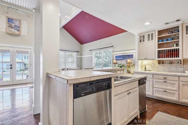 447560 Angler Way, Vinita, OK 74301 - kitchen featuring open shelves, dark tile patterned flooring, stainless steel dishwasher, backsplash, and visible vents