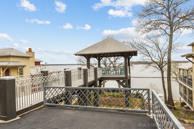 447560 Angler Way, Vinita, OK 74301 - view of property's community with a water view and fence