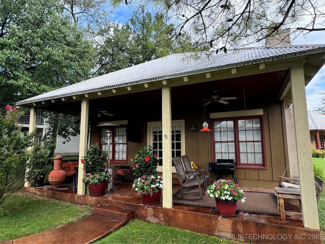 447560 Angler Way, Vinita, OK 74301 - back of property featuring metal roof and ceiling fan