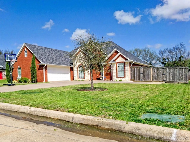 ranch-style home featuring driveway, a front yard, fence, brick siding, and a garage
