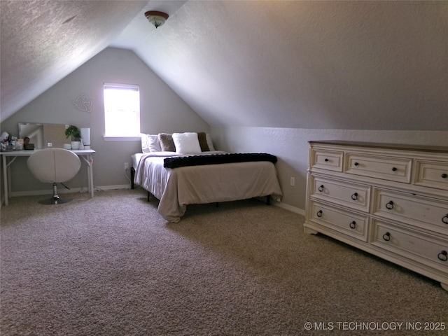 carpeted bedroom with baseboards, lofted ceiling, and a textured ceiling