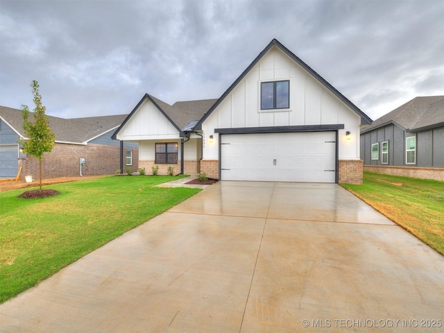 13406 E 124th St, Collinsville, OK 74021 - modern inspired farmhouse with a garage, brick siding, a front lawn, board and batten siding, and driveway