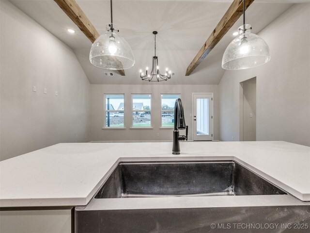 13406 E 124th St, Collinsville, OK 74021 - kitchen featuring visible vents, a sink, pendant lighting, vaulted ceiling with beams, and an inviting chandelier