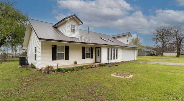 cape cod-style house featuring a front yard, central air condition unit, a garage, metal roof, and a porch